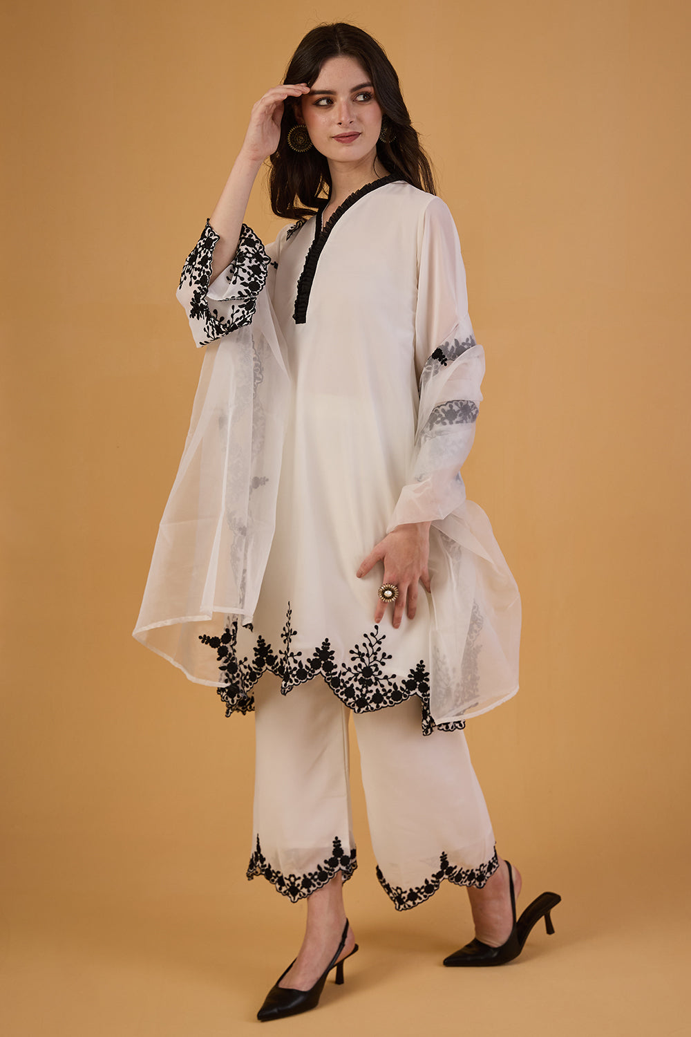 dhartii  Elegant Off-White Embroidered Georgette Suit Set