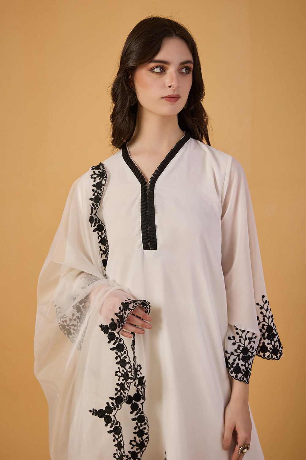 dhartii  Elegant Off-White Embroidered Georgette Suit Set