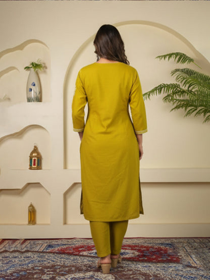 Yellow color cotton suit set with fine embroidery and elegance