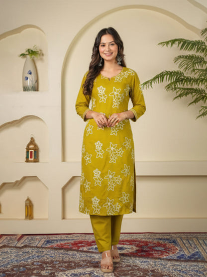 Yellow color cotton suit set with fine embroidery and elegance