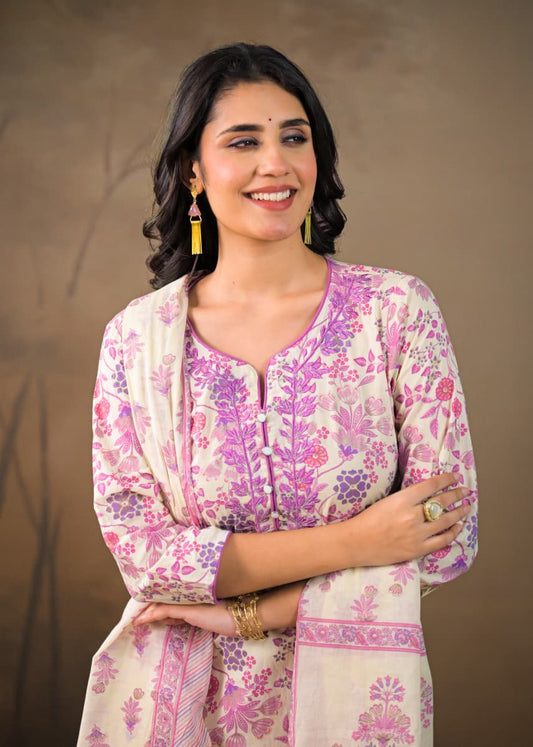 Women's cotton suit set in purple adorned with Kalamkari prints