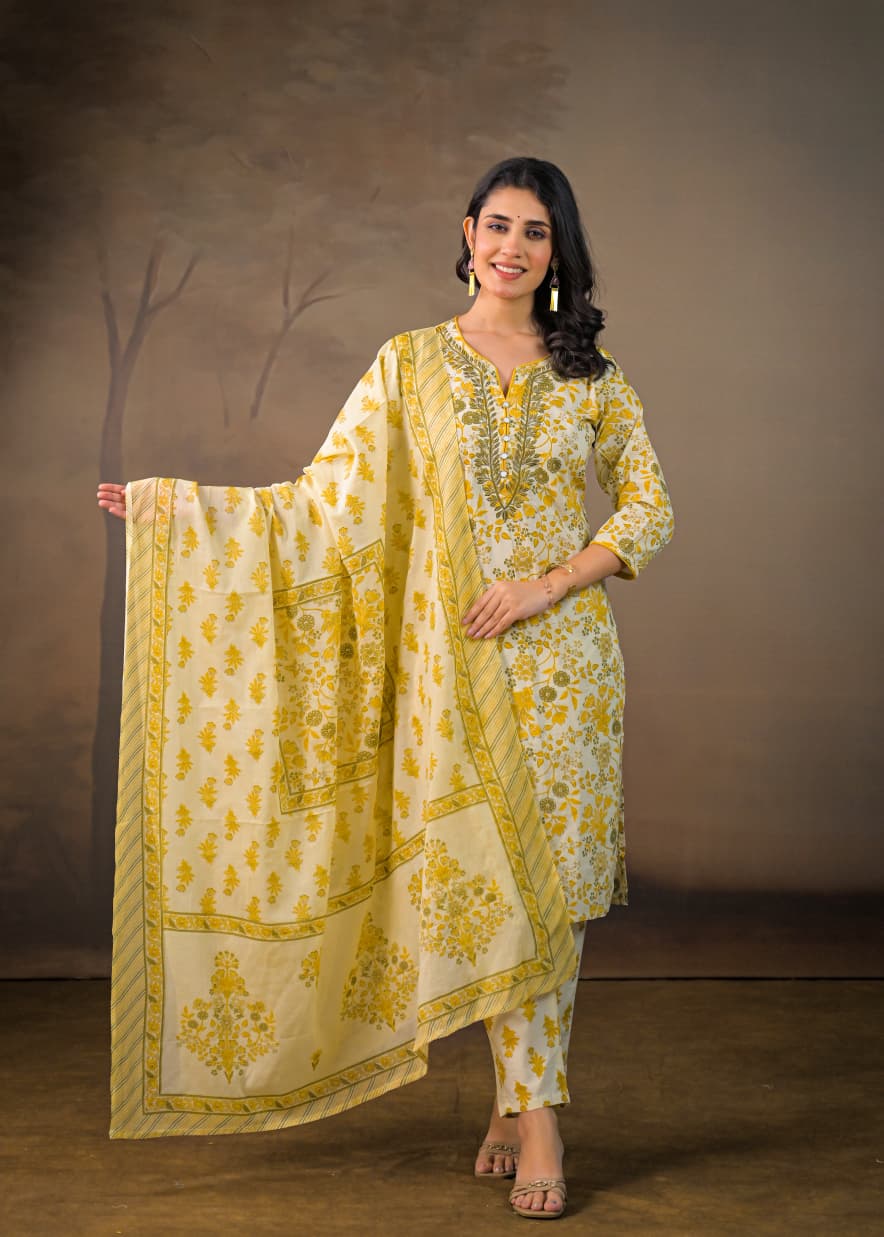 Women's cotton suit set in yellow adorned with Kalamkari prints