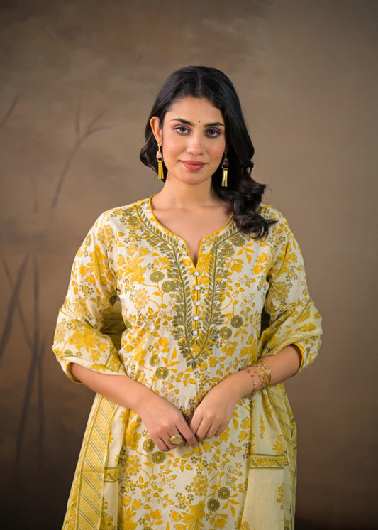 Women's cotton suit set in yellow adorned with Kalamkari prints